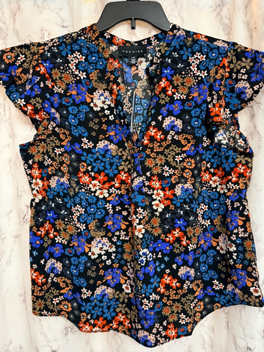 Premise Black Floral Split V-Neck Short Sleeve Top with Blue & Red Accents